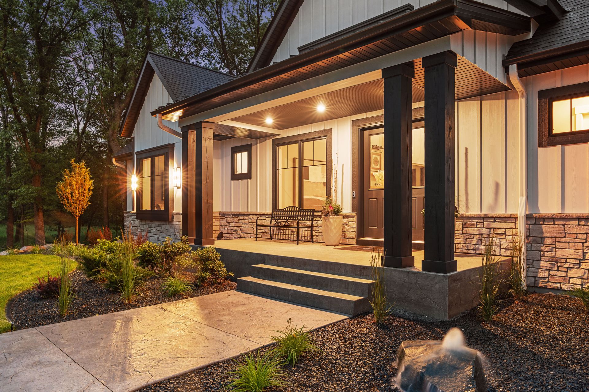 Front porch illuminated at dusk